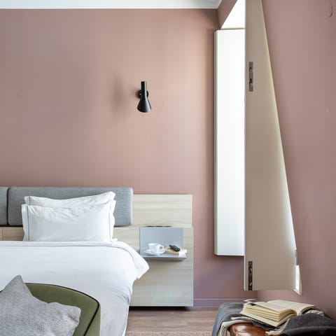 Wake up in the dreamy bed with its luxury linens, feeling rested and ready for another day of Lisbon sightseeing