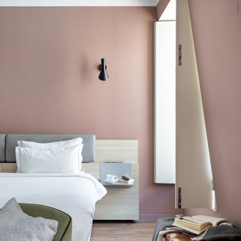 Wake up in the dreamy bed with its luxury linens, feeling rested and ready for another day of Lisbon sightseeing