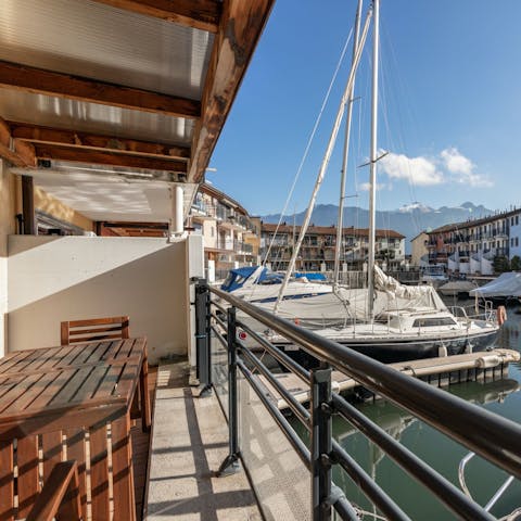 Enjoy a canal-side coffee or cocktail on the balcony