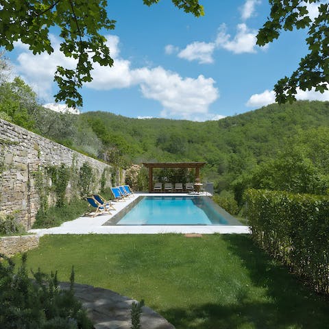 Find peace and relaxation while lounging by the pool