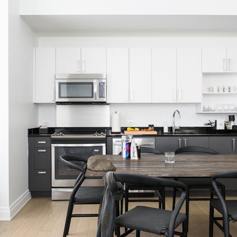 A modern kitchen and dining area