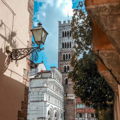 Explore Lucca's Duomo, with its holy statues and rich history