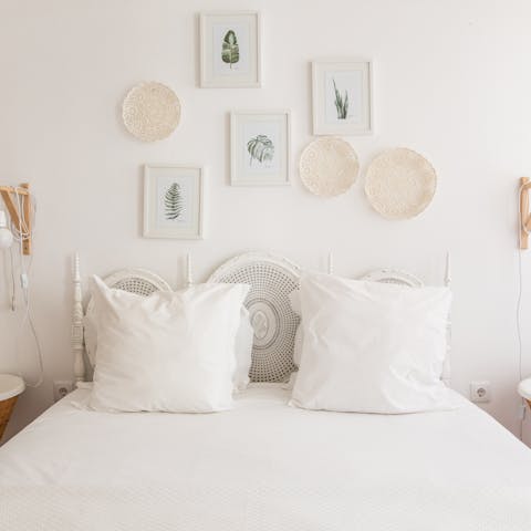 Wake up feeling refreshed in the boho chic master bedroom, ready for another day of sightseeing