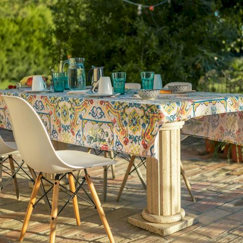 Cook pizza in the wood oven and dine alfresco