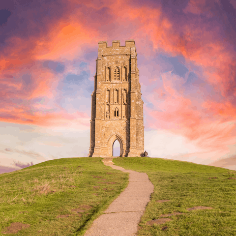 Climb to the top of the Glastonbury Tor, about 10 miles away