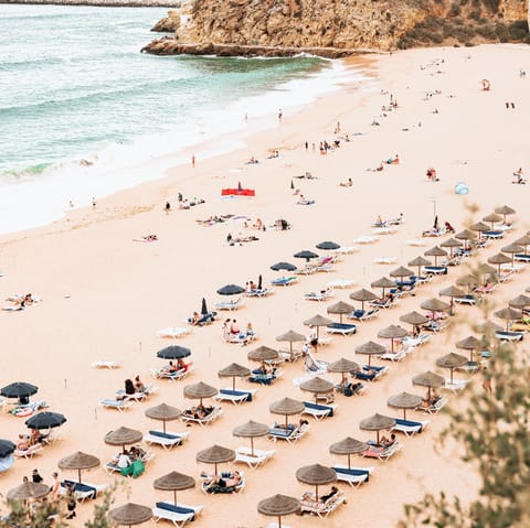Drive down to the sunny and golden coast of Praia dos Alemaes and catch a perfect holiday tan