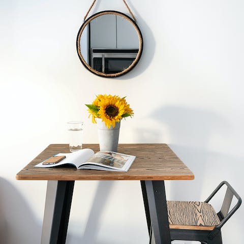 A reclaimed wood bar table