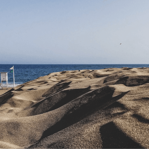 Visit the gorgeous Maspalomas Beach, just a twelve-minute drive away