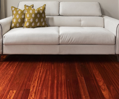 The dark red wooden floors