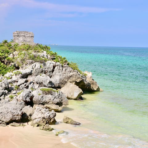 Discover Tulum's ancient Mayan ruins, a ten-minute drive away