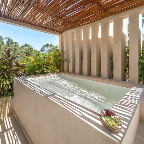 Sip a margarita while you soak in the hot tub