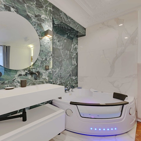 Sink into relaxation in the jacuzzi bathtub