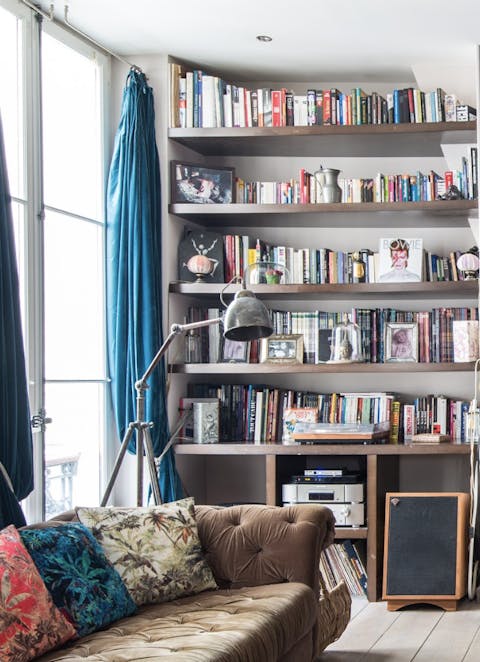 Rifle through the shelves for books, DVDs and vinyl records to play