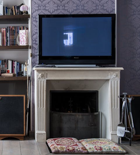Start the log-burning fire for a cosy evening in