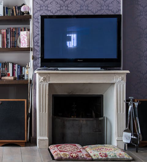 Start the log-burning fire for a cosy evening in
