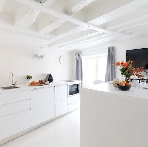 Spotless kitchen with plenty of work surfaces