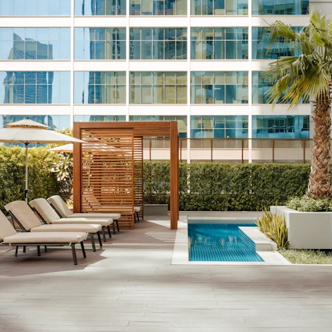 Head down to the communal pool or visit the juice bar for some cool refreshments