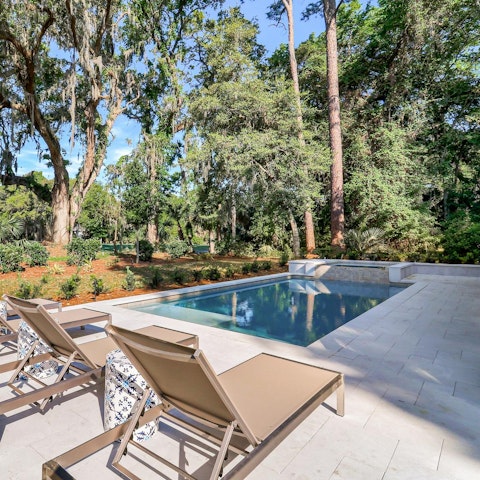 Embrace total relaxation while lounging by the pool