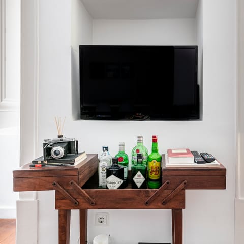 Fix a drink from the vintage mini bar and relax after a slap up feast of Portuguese cuisine