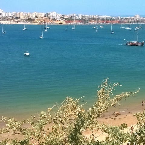 Spend the day on beautiful Praia do Amado, 450 metres away