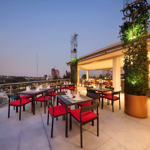 Relax with a drink on the shared terrace after a busy day