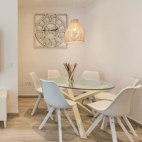 Share leisurely breakfasts and fresh juice around the sleek glass table