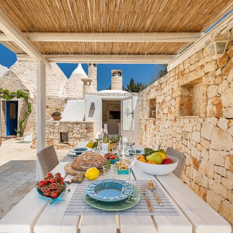 Sample some of the local cuisine alfresco on the courtyard
