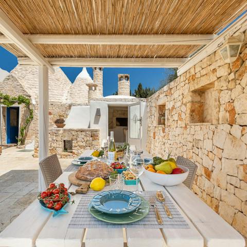 Sample some of the local cuisine alfresco on the courtyard