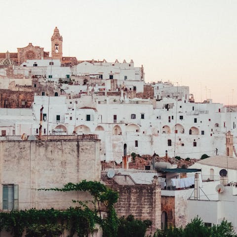 Explore the whitewashed town of Ostuni, home to Gothic cathedrals and an Adriatic coastline