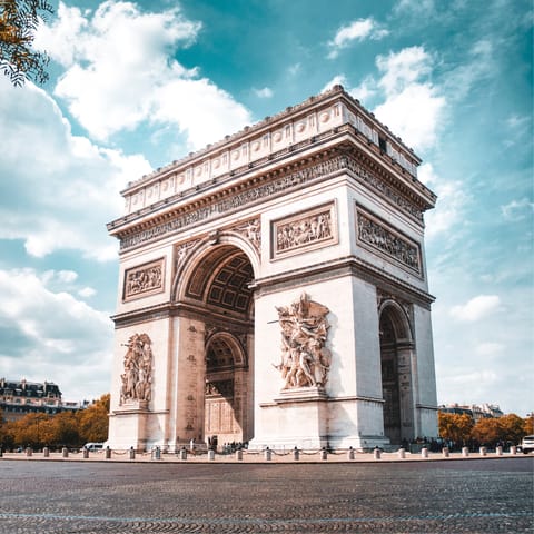 Gaze up at the iconic Arc de Triomphe, just a short stroll from your door