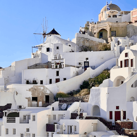 Walk twelve minutes into Mykonos for dinner