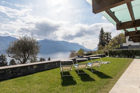 Stretch out on the lawn as Lake Como unfolds below