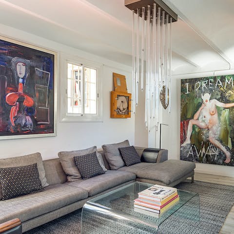 Sprawl out on the sofas with a book from the home's collection