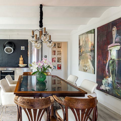 Dine in your eclectic dining room surrounded by artworks