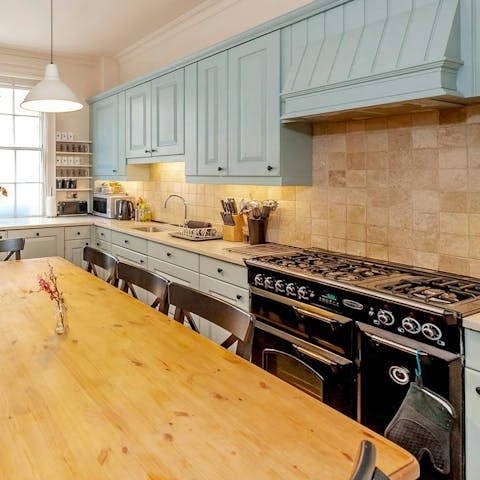 Cook meals together in the large kitchen