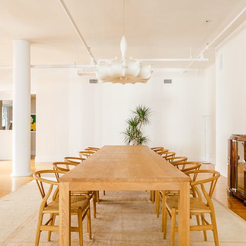 Gather the whole group around the long dining table for 12