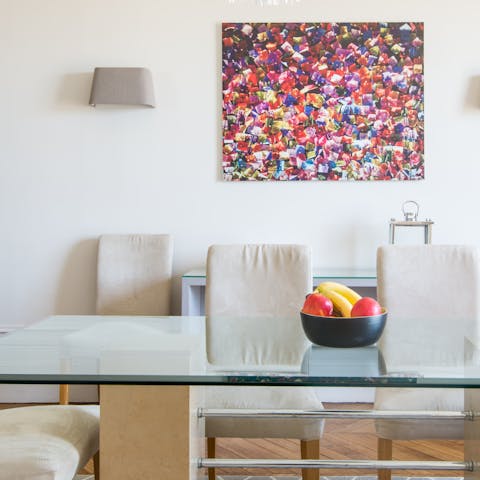 Come together for atmospheric mealtimes with views of the Eiffel Tower