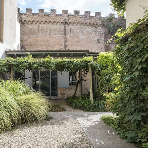 Enjoy some down time in the communical garden dappled with greenery