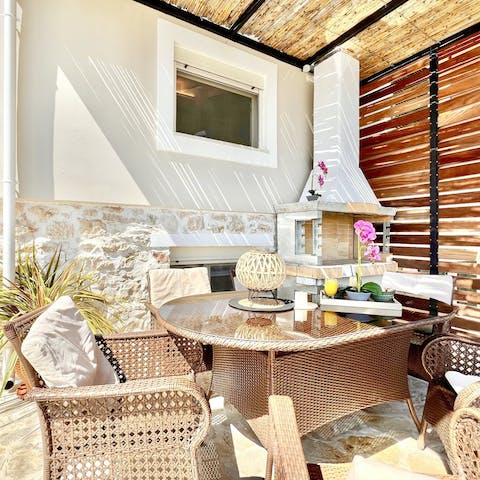 Serve up your favourite Greek dishes at the alfresco dining table