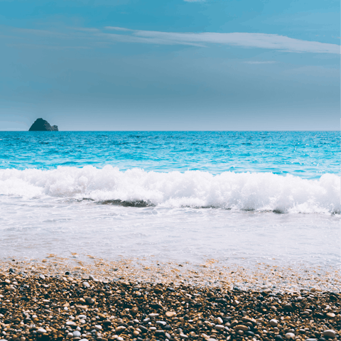 Start the morning with a stroll along Kerasia Beach