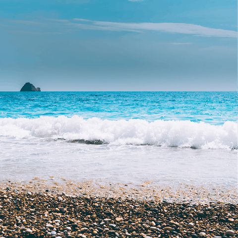 Start the morning with a stroll along Kerasia Beach