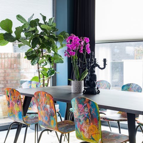 Sit down on the unique graffiti chairs ready for a home-cooked supper