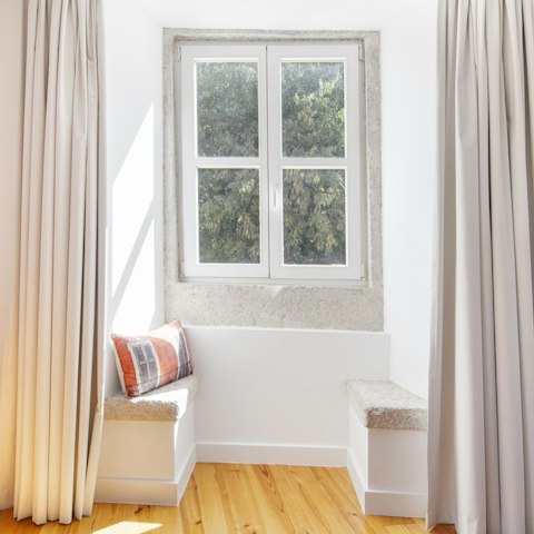 Set yourself up in the window with a good book and while away a couple of hours reading by the window