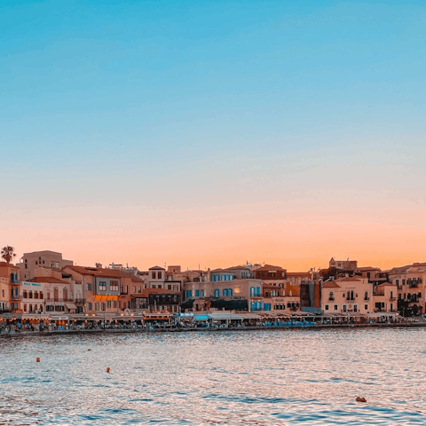 Explore the shops, restaurants, and bars along the Old Venetian Harbour