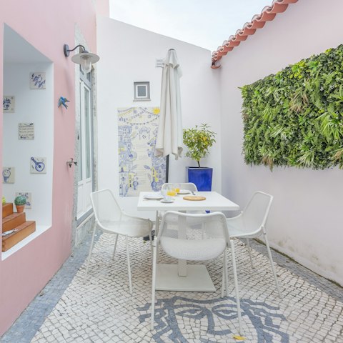 Enjoy sunny breakfasts in the beautiful tiled garden