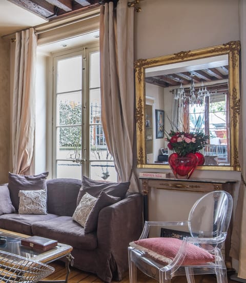 The large gilded mirror