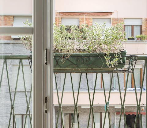 Breathe in some fresh air on the little balcony