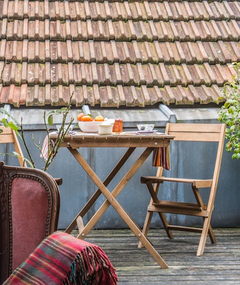 Enjoy a champagne on the rooftop terrace