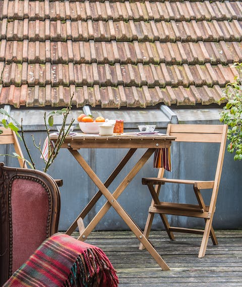 Enjoy a champagne on the rooftop terrace