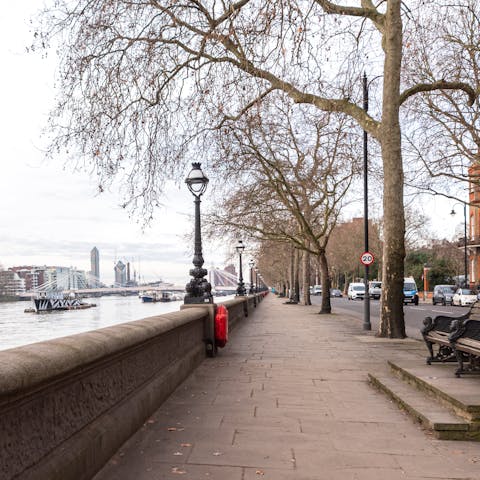 Cross Albert Bridge for riverside views and leafy strolls